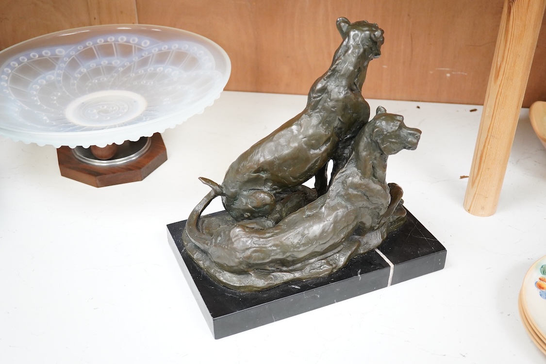 Miguel Fernando Lopez (Portuguese, contemporary): A painted bronze group of two lionesses